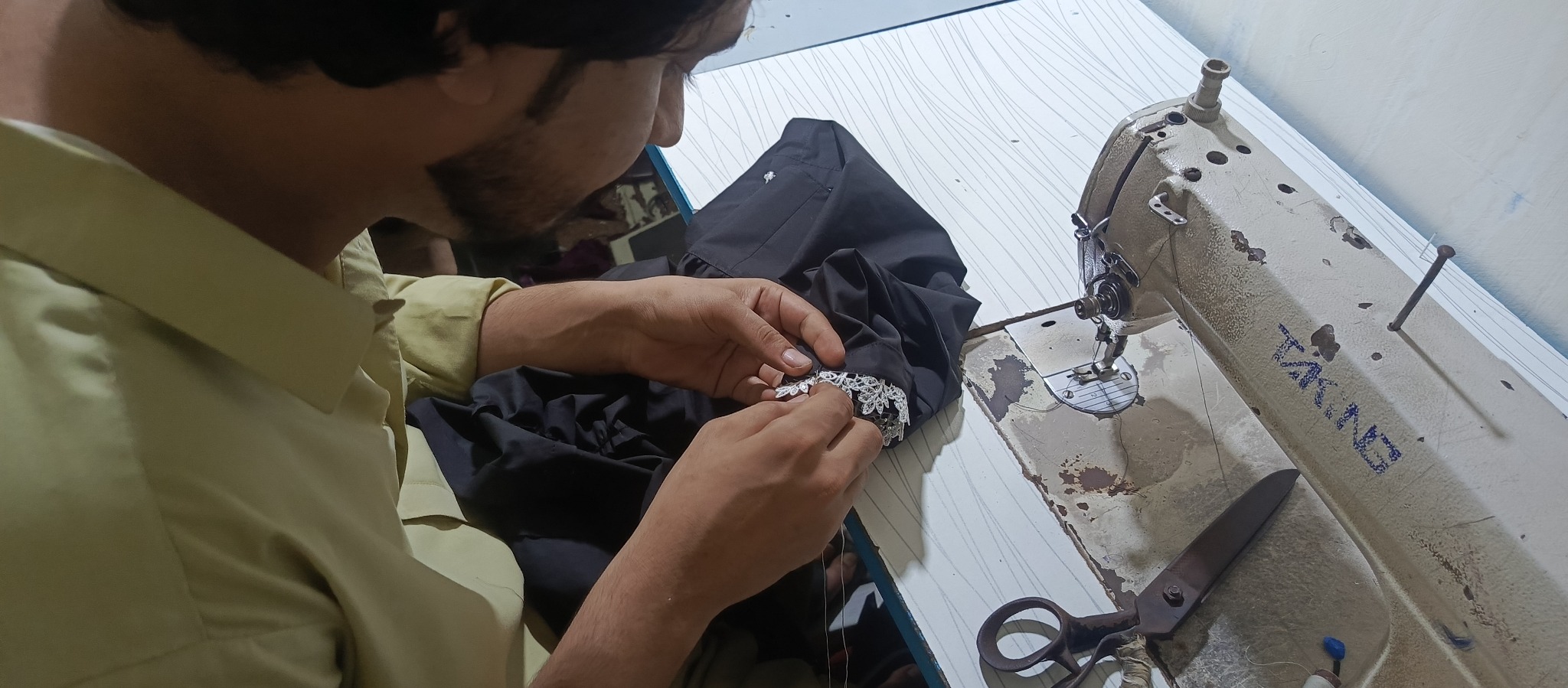 Ideal Star Tailor stitching team